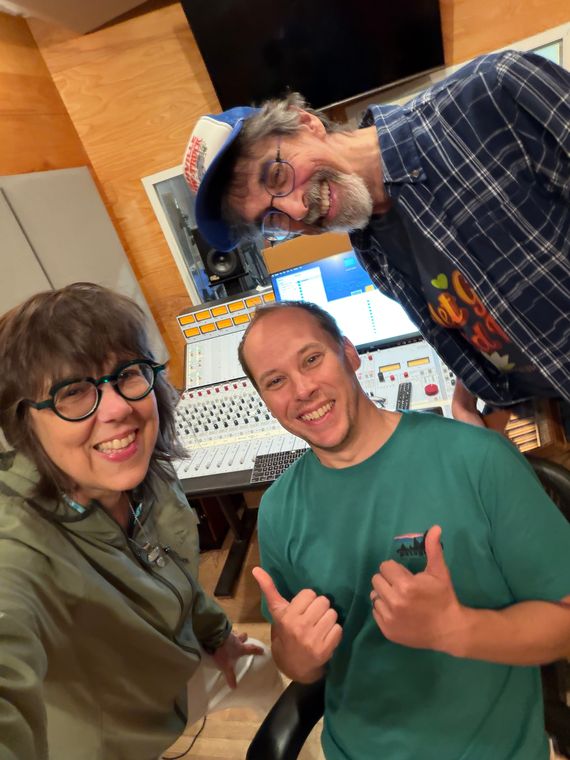 Beth Falcone and two collaborators taking a selfie at the mixing console.